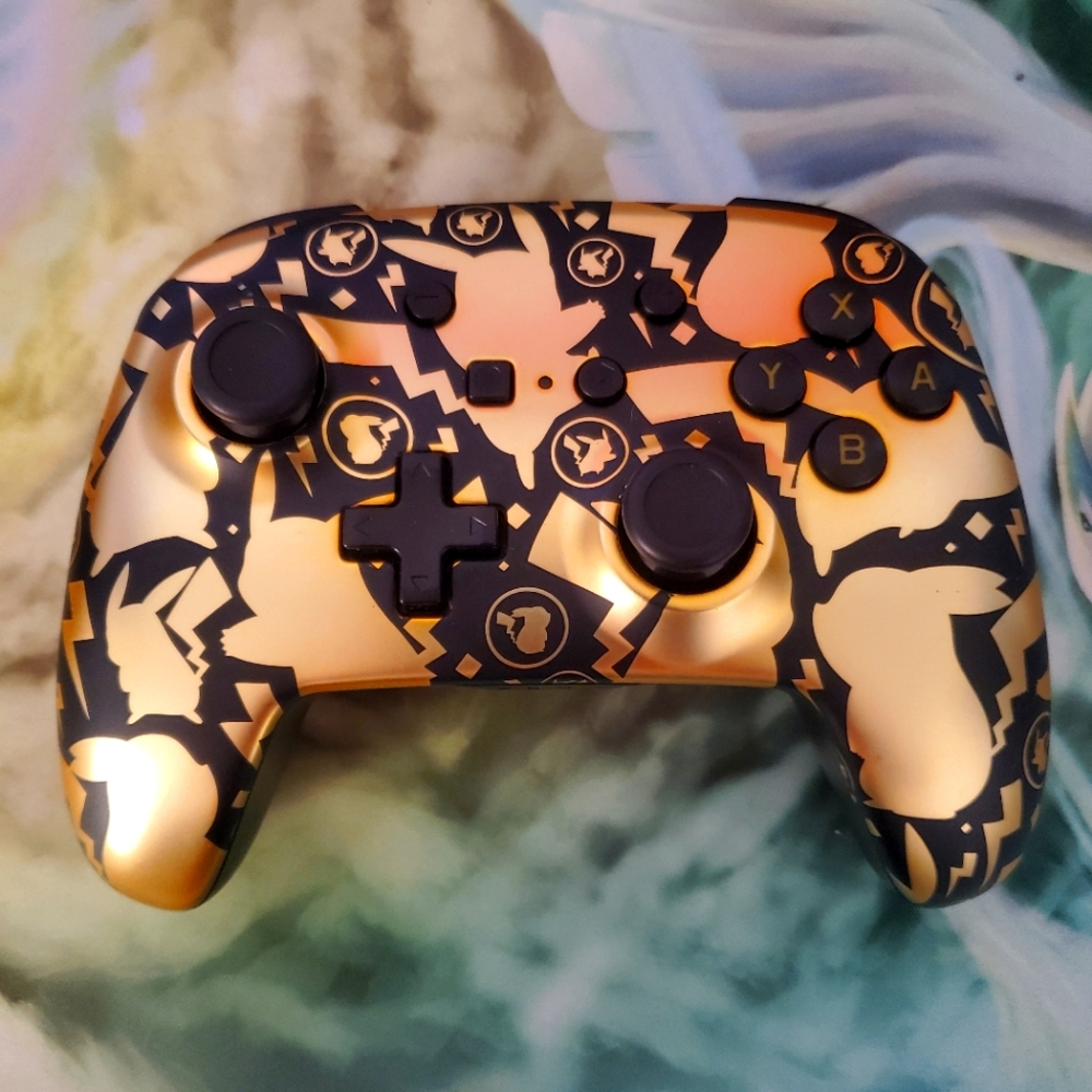 Gold and black pikachu Nintendo switch controller wireless